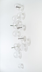 This elegant contemporary glass wall sculpture was created by Cheryl Wilson Smith.
