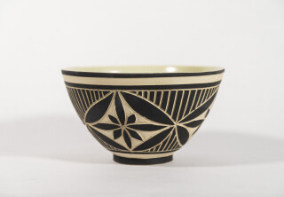 This striking hand-built and engraved bowl is by ceramicist Loren Kaplan.
