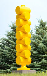 In eye-catching bright yellow, minimalism meets pop art in this playful sculpture by Alexander Caldwell.