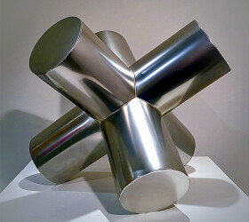 Forged from highly polished stainless steel, this dynamic contemporary indoor sculpture is by Canadian artist Alexander Caldwell.