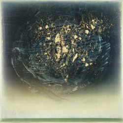 A ghostly globe of light blue and gold emerges, spinning, from an inky ground in this luminous canvas by Alice Teichert.