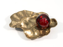 Luscious pomegranate red glass nesting in a bronze casing. Image 6