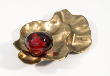 Luscious pomegranate red glass nesting in a bronze casing. Image 5