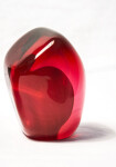 A grouping of luscious pomegranate red glass and one single seed. Image 5