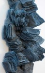 In this dynamic wall sculpture by Cheryl Wilson-Smith fine layers of glass frit squares (ground glass) in indigo blue are stacked to create … Image 3