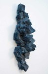 In this dynamic wall sculpture by Cheryl Wilson-Smith fine layers of glass frit squares (ground glass) in indigo blue are stacked to create … Image 2