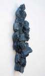 In this dynamic wall sculpture by Cheryl Wilson-Smith fine layers of glass frit squares (ground glass) in indigo blue are stacked to create … Image 2