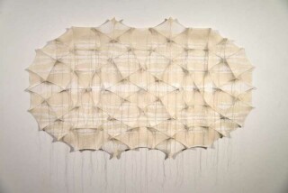Emulating the beauty of a sunlit spider’s web, this new pure white tapestry by fabric artist Chung-Im King continues her exploration of patt…