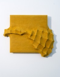 In earthy rich tones of mustard yellow, fabric designer Chung-Im Kim has once again created a striking wall tapestry out of felt.