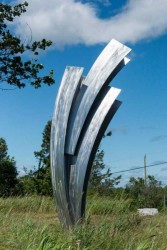 This elegant outdoor sculpture by contemporary artist Claude Millette has a minimalist aesthetic.