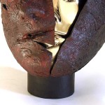 A gold patinated head bursts from its shell of bronze in this aptly titled sculpture by Dale Dunning. Image 5