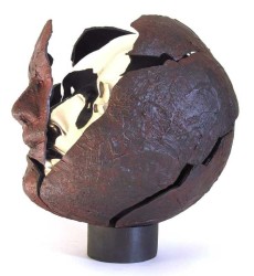 A gold patinated head bursts from its shell of bronze in this aptly titled sculpture by Dale Dunning.