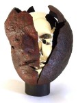 A gold patinated head bursts from its shell of bronze in this aptly titled sculpture by Dale Dunning. Image 2