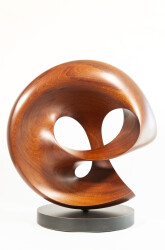 The elegant, lyrical curves of this abstract sculpture by David Chamberlain are hand-carved from one continuous loop of mahogany wood.