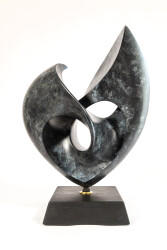 The lyrical lush lines of this heart-shaped bronze sculpture were created by the American artist David Chamberlain.