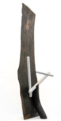 At once intriguing and dynamic, this abstract wood sculpture was created by Edward Falkenberg.