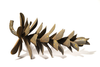 Hand-forged from weathering steel, Floyd Elzinga’s series of tabletop pine cones mimic the organic shape of the natural object.