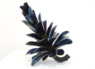 Pop art inspired, this blue patinated stainless steel pine cone is playful and unique.