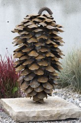 Elzinga’s work merges still life with Pop Art in this outdoor pine cone sculpture.