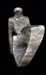 From a single piece of silver cloud alabaster, the artist has carved a poetic and modern depiction of a reclining figure. Image 4
