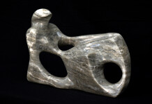 From a single piece of silver cloud alabaster, the artist has carved a poetic and modern depiction of a reclining figure. Image 2
