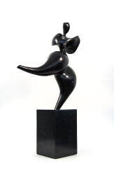 The graceful form of a female figure emerges from hand-chiselled black granite in this classically elegant sculpture by Jeremy Guy.