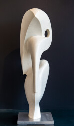 Smooth surfaced, white marble has been engineered into a poetic and modern depiction of a heron by sculptor Jeremy Guy.