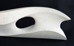 Smooth surfaced, engineered white marble sculpture flecked almost imperceptibly with grey has been sculpted into an elegant abstracted wave. Image 3