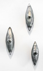 This stunning grouping of three sculptural pieces was created by glass artist Julia Reimer.