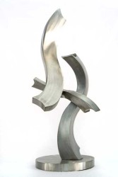Free flowing, the elegant s-shaped curves of this sculpture were created by American artist, Kevin Robb.