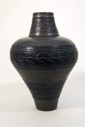 This elegantly shaped ceramic jar in jet black and umber (reddish-brown) colours is one of Loren Kaplan’s new vessels.