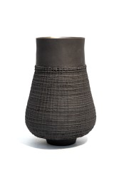 This exquisitely detailed basalt clay vessel was created by Loren Kaplan.