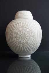 This beautifully detailed medium-sized porcelain vessel was created by ceramicist Loren Kaplan.