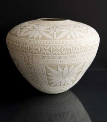 This exquisitely detailed and finely crafted porcelain vessel was created by ceramicist Loren Kaplan.