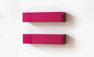 In shiny hot pink, two vertical rectangles sit side by side ‘in sync’ in this elegant wall sculpture by California artist, Lori Cozen-Geller…