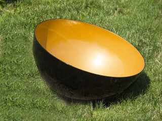 Based the Tibetan singing bowls, this stainless steel outdoor sculpture bowl by Marlene Hilton Moore is powder coated gold on the inside and…