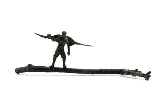 A sprite with maple key wings balances on a branch in this collectible bronze scupture by P.