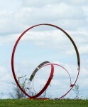 This elegant contemporary outdoor sculpture in bright poppy red was hand-forged from stainless steel by Philippe Pallafray. Image 2