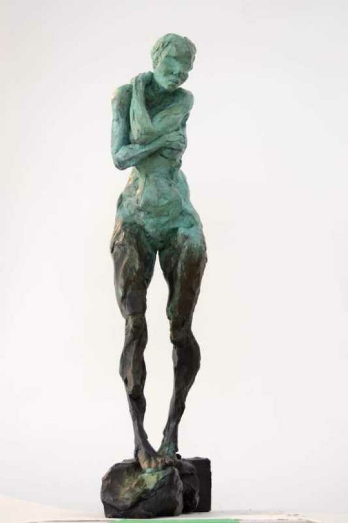 This expressive, intimate sculpture of a female is by Canadian artist Richard Tosczak.