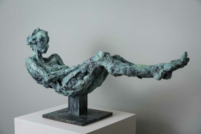 This dramatic piece by Canadian artist Richard Tosczak captures a moment in time—a human figure in repose appears to be struggling to sit up…