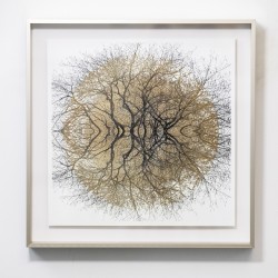 From beneath mirrored images of budding tree branches, a gold sun emerges through precise perforations in this mixed media image by Ryan Van…