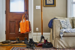 This charming photograph of the artist’s foyer feels both familiar and intimate.