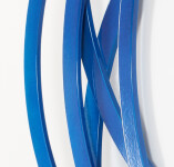 An arresting abstract wall sculpture in bright blue is one of a series created by Canadian artist Shayne Dark. Image 5