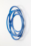 An arresting abstract wall sculpture in bright blue is one of a series created by Canadian artist Shayne Dark. Image 2