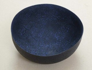 The sophisticated colours and textures of this blue bowl, by celebrated ceramicist Steven Heinemann, were created through a lengthy process.