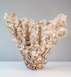 Sculpted of earthenware paper clay, this dynamic work by Canadian artist Susan Collett is multi-fired to achieve complex surfaces.