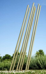 In this stunning new outdoor sculpture by Tonya Hart, seven brilliant brass rods rise out of the earth like beams of light.