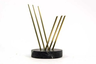 Solid steel rods coated in brilliant brass rise out of a soapstone base and reach upward in this stunning table-top sculpture by Canadian ar…