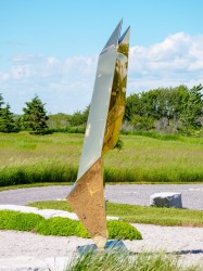This highly reflective, gold electro-plated outdoor sculpture by Viktor Mitic is visible at a distance in full sun.