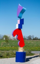 Colourful aluminum shapes are stacked in a playful outdoor totem by Toronto-based artist Viktor Mitic.